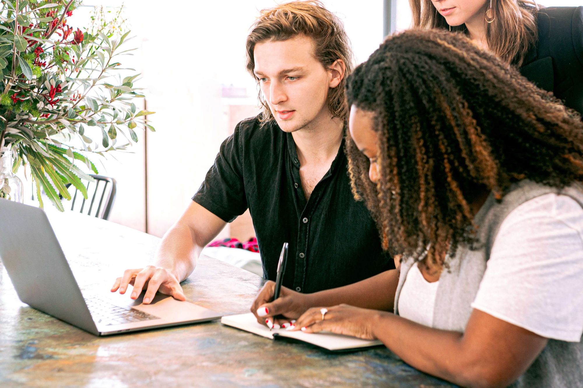 Marketers working on laptop