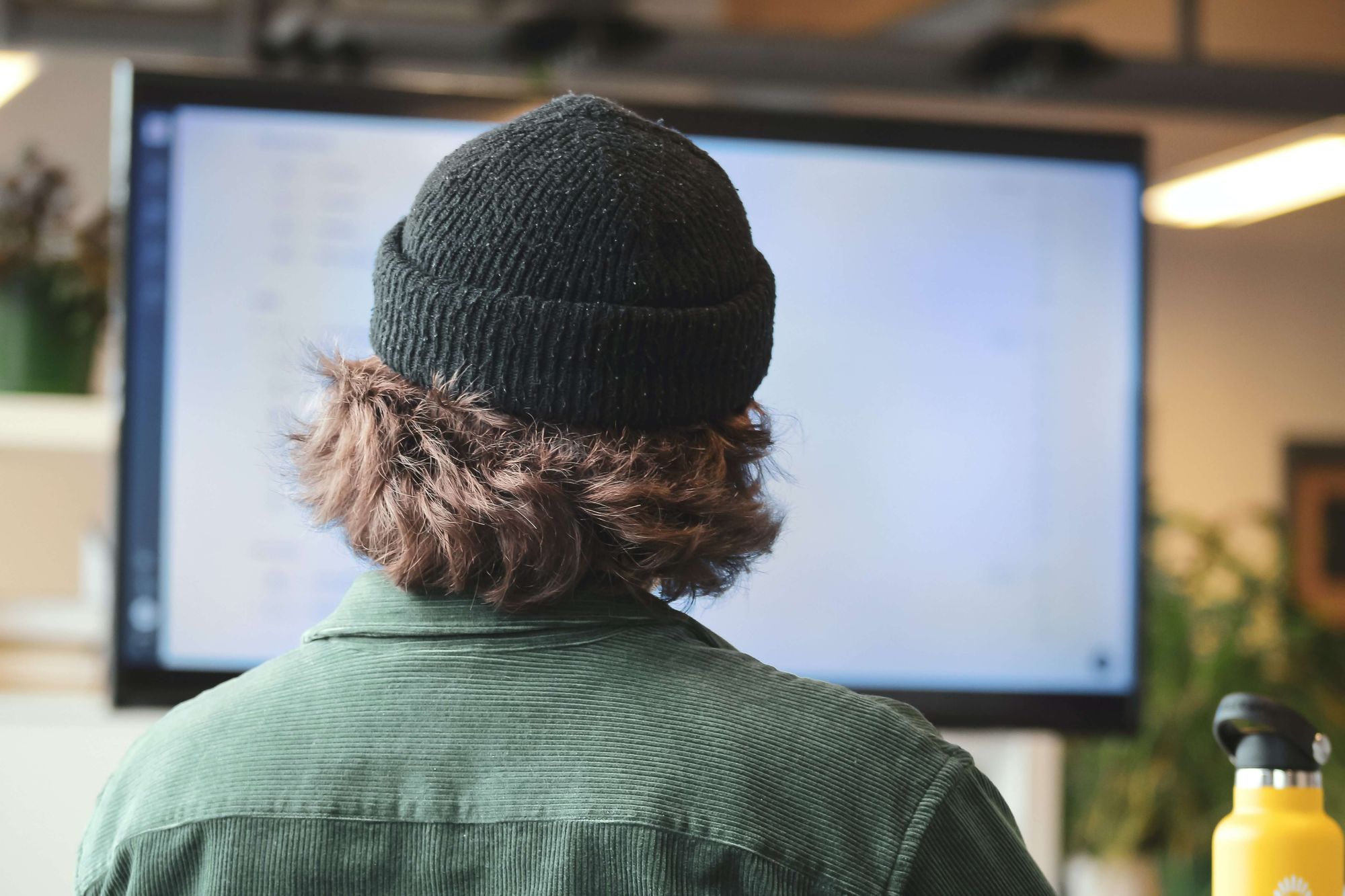developer working remotely on his computer